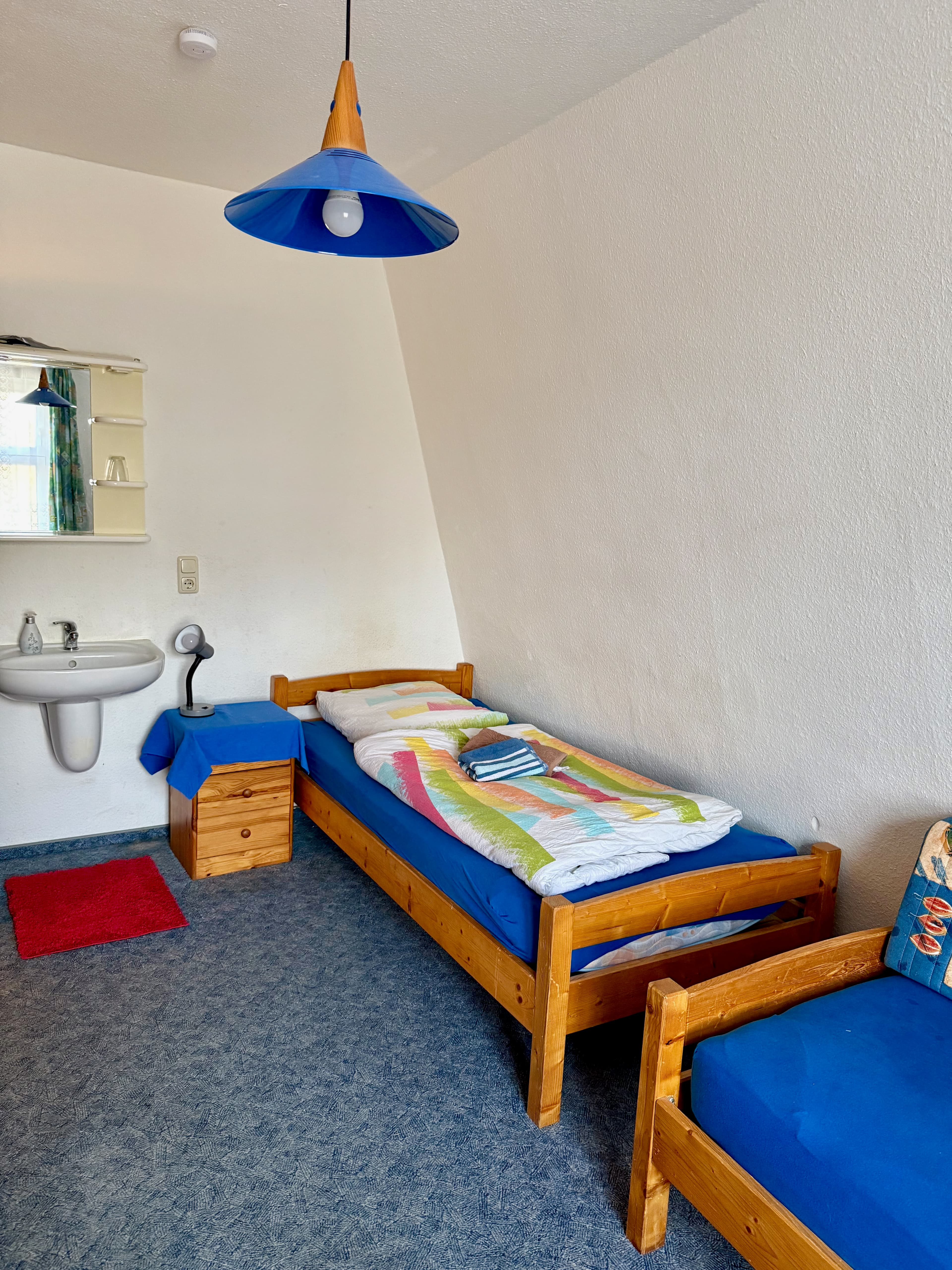 Einblick in Zimmer und Aufenthaltsbereiche bei Pein's Gästehaus 6