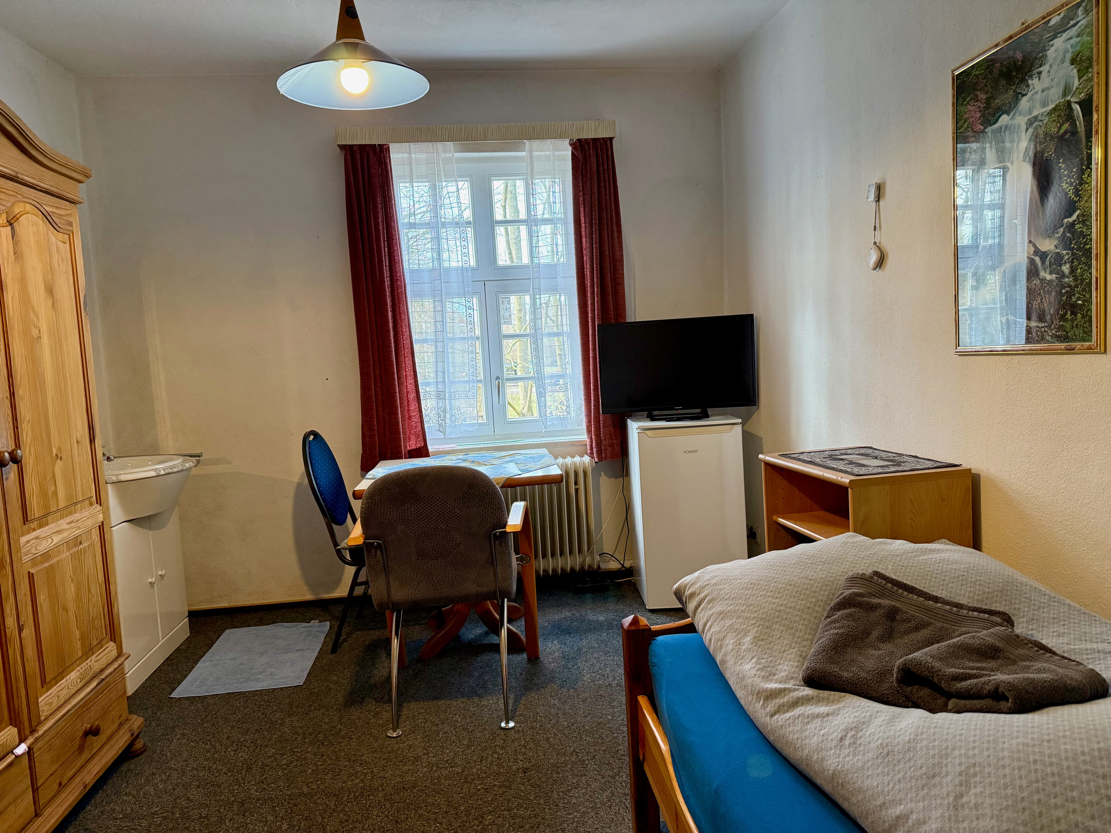 Einblick in Zimmer und Aufenthaltsbereiche bei Pein's Gästehaus 10